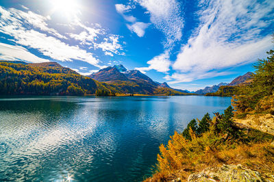 Lake sils maria, in the engadine, photographed in autumn, with landscape and mountains above it.