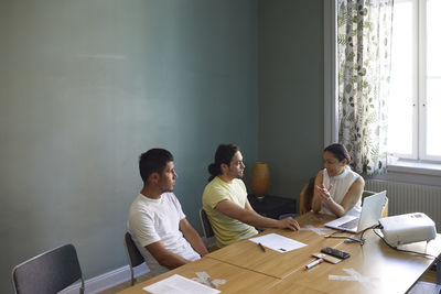 People in boardroom during business meeting