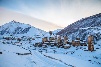 Scenic view of snowcapped mountains against sky