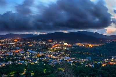 High angle view of illuminated buildings in city against sky