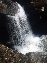 Waves splashing on rocks