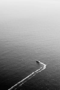 High angle view of boat sailing on sea