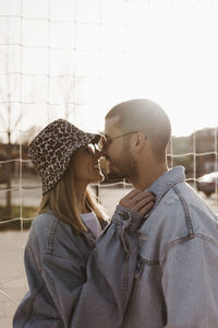 Happy couple looking each other and touching noses. girlfriend and boyfriend.