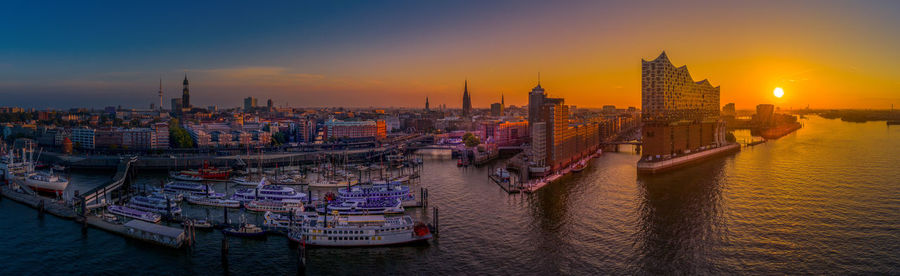 Panoramic view of buildings against sky during sunset in hamburg germany 