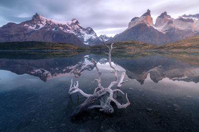 Scenic view of snowcapped mountains against sky