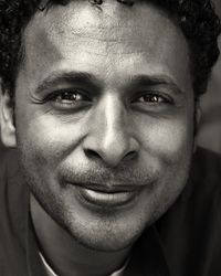 Close-up portrait of smiling young man