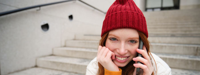 Portrait of young woman looking away