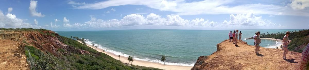 Panoramic view of sea against cloudy sky