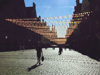 People walking on city street