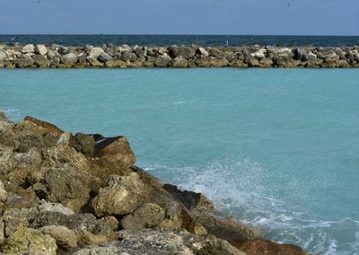 Scenic view of sea against clear sky