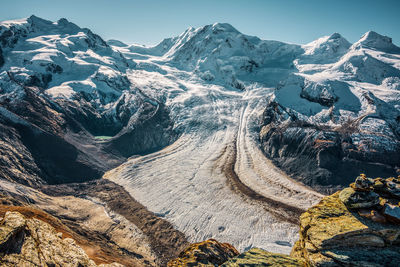 Panoramic view of the gorner glacier and monte rosa mountain range in switzerland .