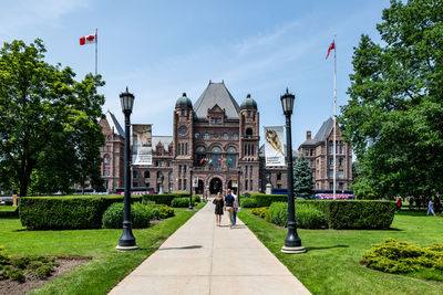 Rear view of woman standing on park