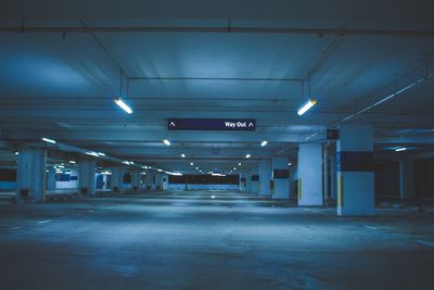 Illuminated underground parking lot at night