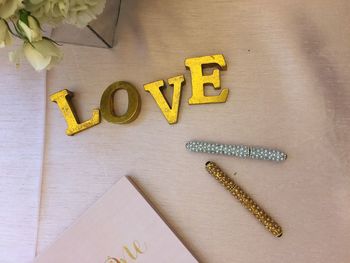 Directly above shot of love text on table