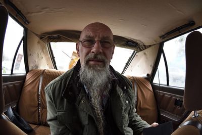 Portrait of man in car