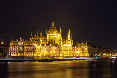 Illuminated city lit up at night