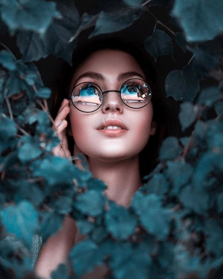 blue, portrait, one person, women, eyeglasses, adult, glasses, young adult, looking at camera, fashion, female, nature, headshot, child, eye, looking, front view, plant part, emotion, leaf, human face, green, childhood, portrait photography, outdoors, fantasy, looking up