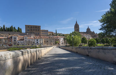 View of the ancient city of salamanca, spain, from the ancient roman bridge over the river tormes