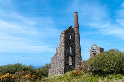 Low angle view of old building against sky