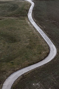 High angle view of empty road amidst landscape