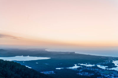 Scenic view of landscape against sky during sunset