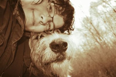 Close-up of woman with dog