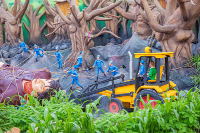 High angle view of stuffed toy by trees