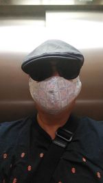 Close-up portrait of man wearing sunglasses