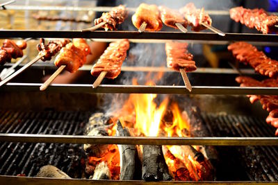 Close-up of meat on barbecue grill