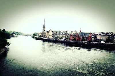 View of river with buildings in background