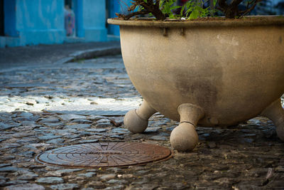 Stone street detail with pots to place plants. pelourinho, salvador, bahia, brazil.
