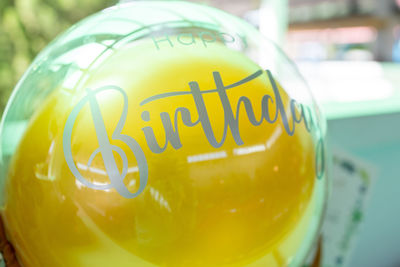Close-up of lemon in glass container