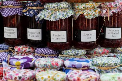 Various jams in jar for sale at market stall