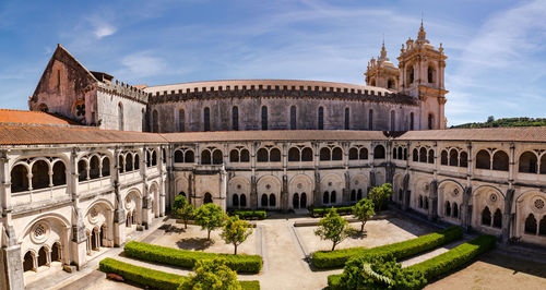 Panorama of the church and cloister of the monastery complex mosteiro de alcobaca, portugal