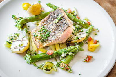 High angle view of fish served in plate on table
