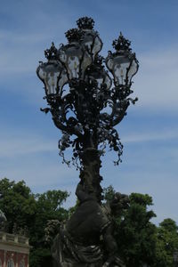 Low angle view of statue against sky