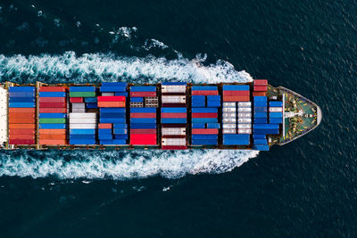 High angle view of container ship in sea