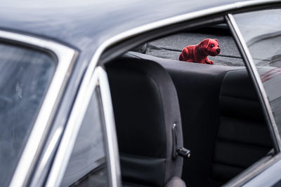 View of a car on side-view mirror