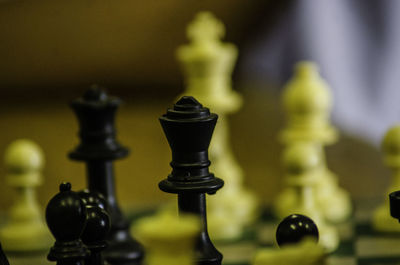 Close-up of chess pieces on board