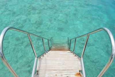 High angle view of stairs into the sea 