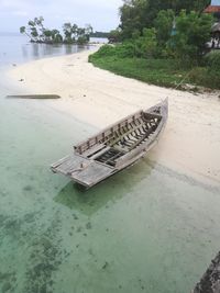 High angle view of deck chairs on beach