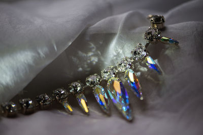 Close-up details of necklace with swarovski crystal stones