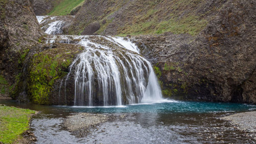 Popular waterfall called stjornarfoss during summer in iceland