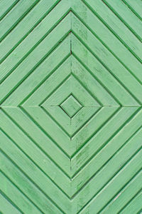 Square geometric pattern, made of wooden bars