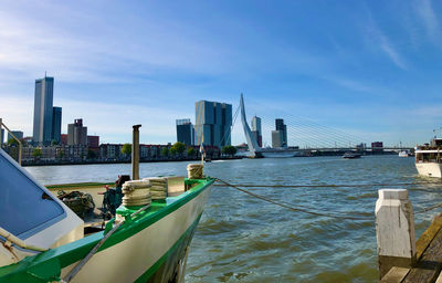 Boats in sea against sky