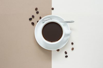 High angle view of coffee cup on table