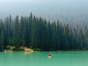 Boat sailing in lake