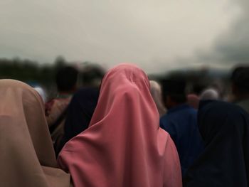 Rear view of people at temple