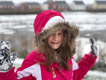 Portrait of girl wearing warm clothing during winter