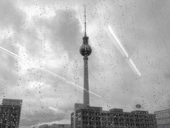 Low angle view of skyscrapers against sky in city